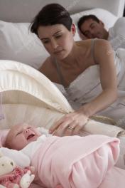 depositphotos_11881525-stock-photo-newborn-baby-crying-in-cot